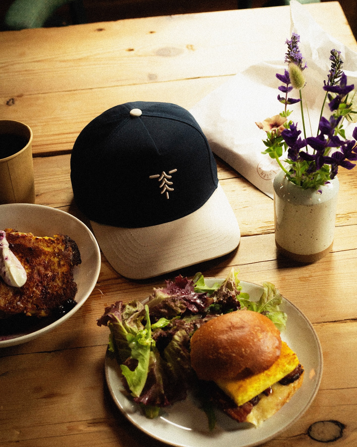Instagram post with the caption: The Myles (A1A) - our go-to hat for the long road and every stop...
